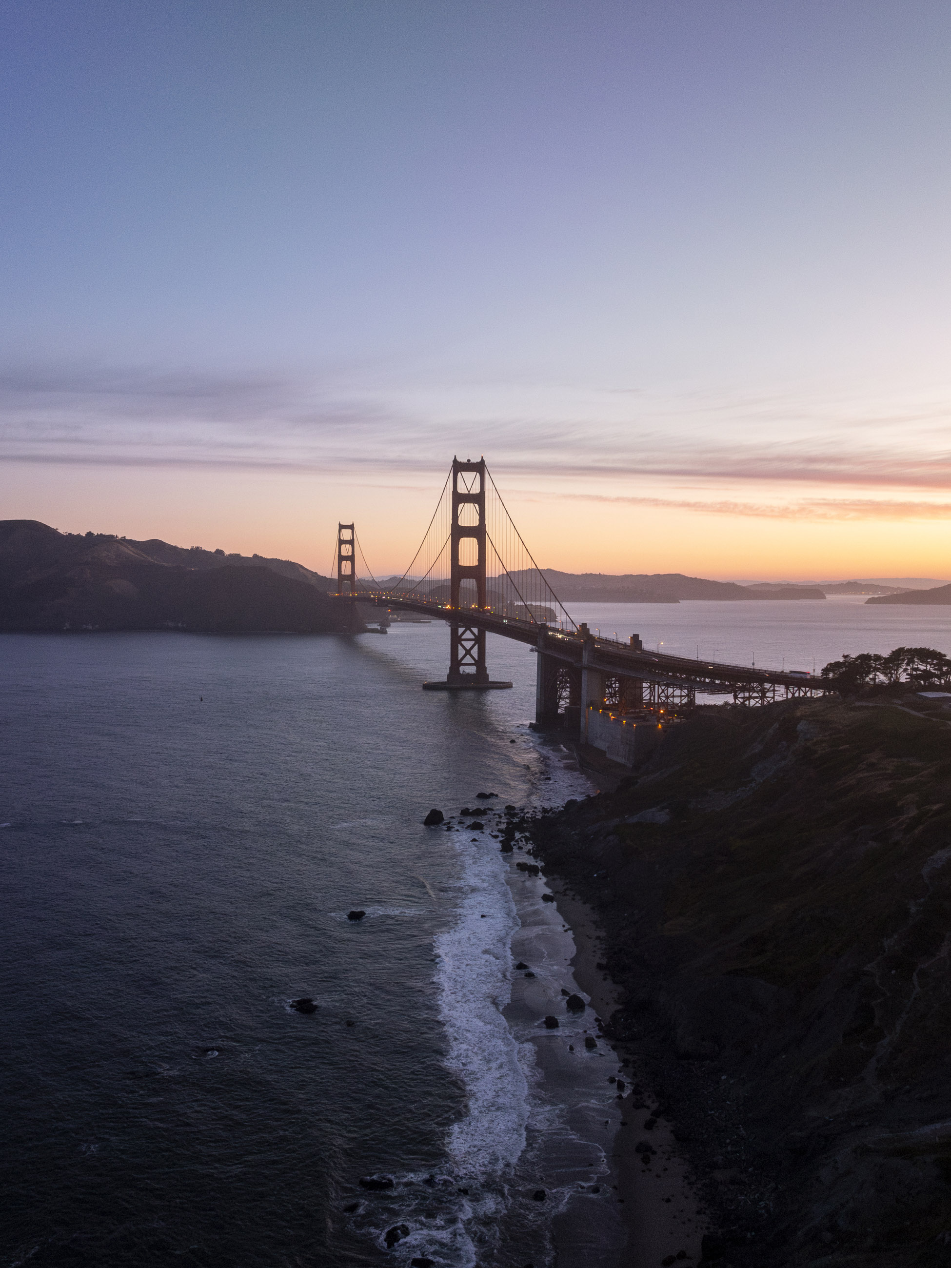 Golden Gate Bridge and ocean at sunrise