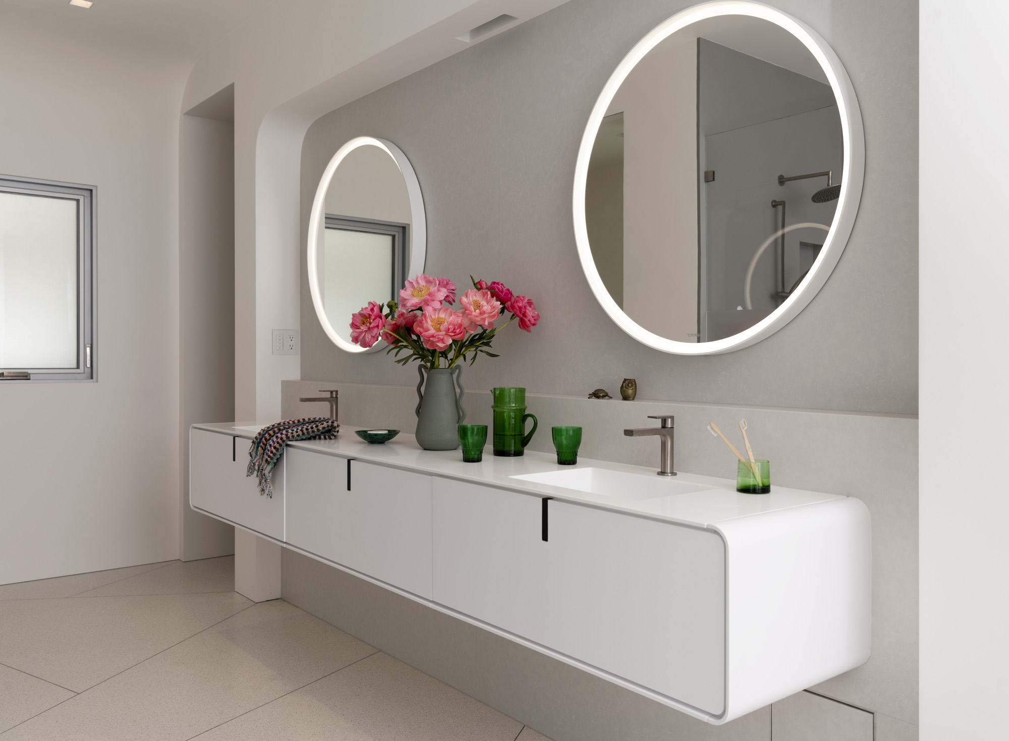 Bath vanity, bright sunlit interior