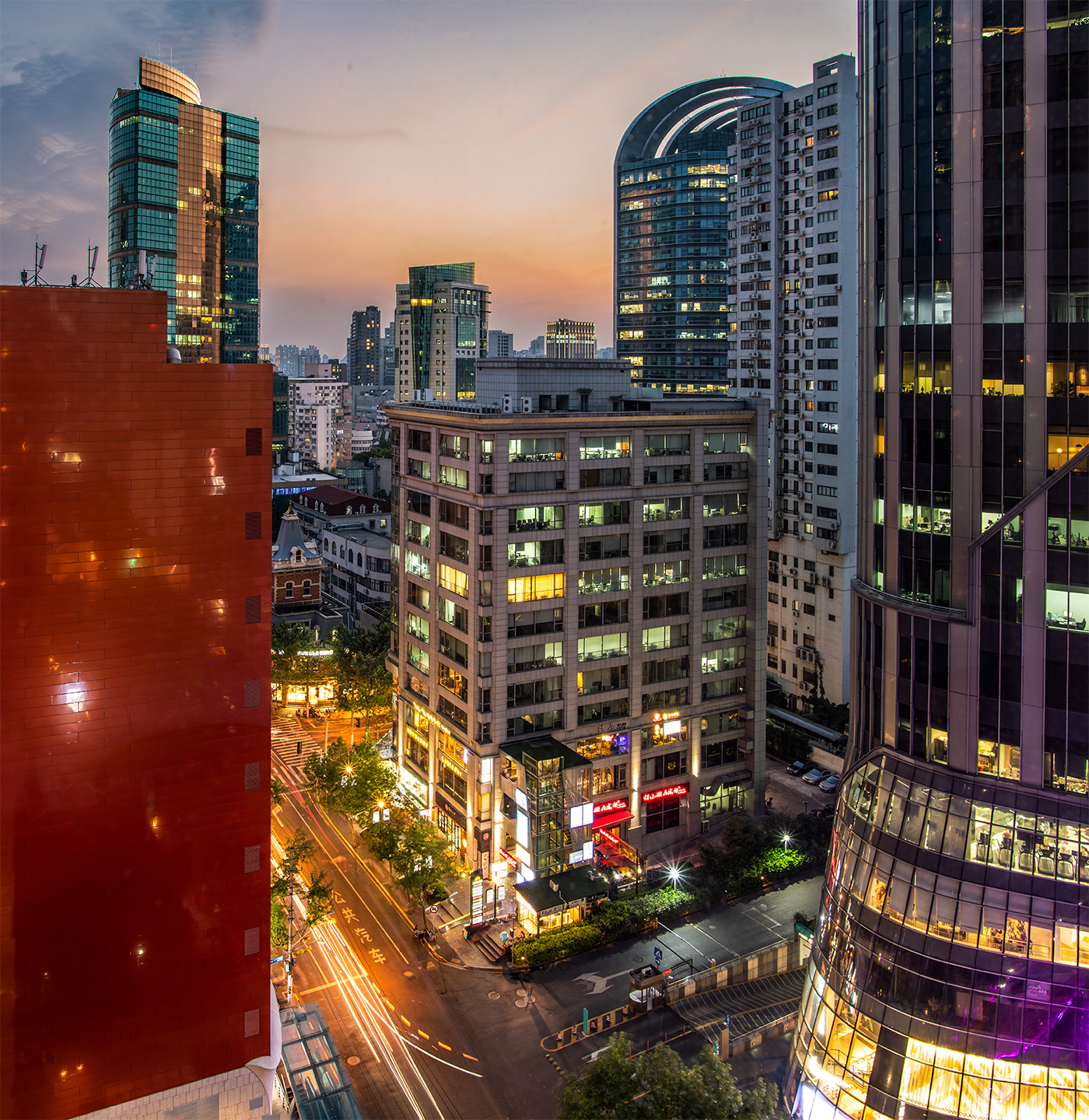 aerial view overlooking the city skyline of the Shanghai Jing'an district at night