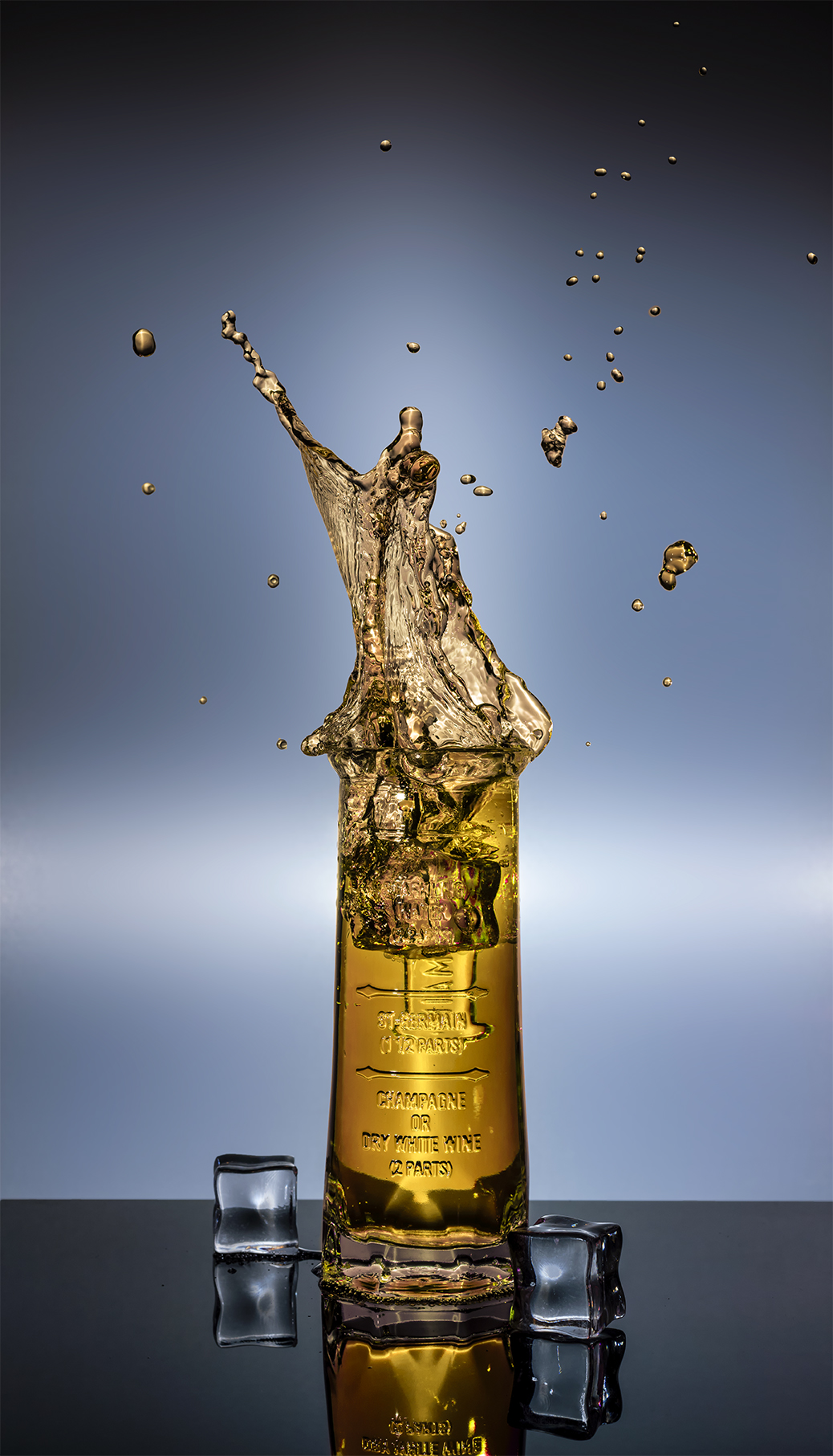 brand splash photography of St Germain cocktail splashing out of glass